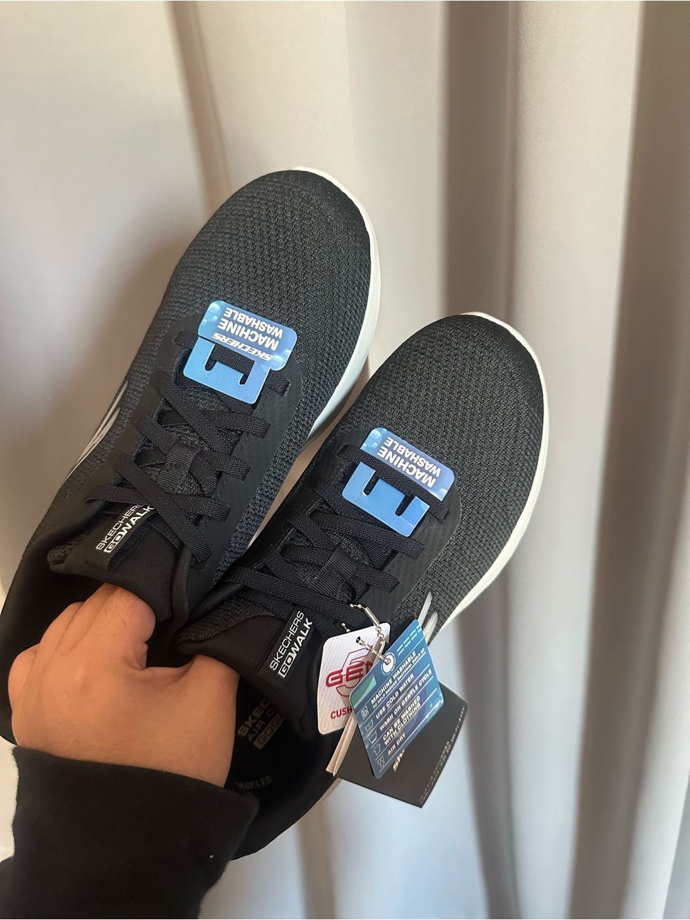 NWT Skechers Black and White Knit Slip-On Sneakers
